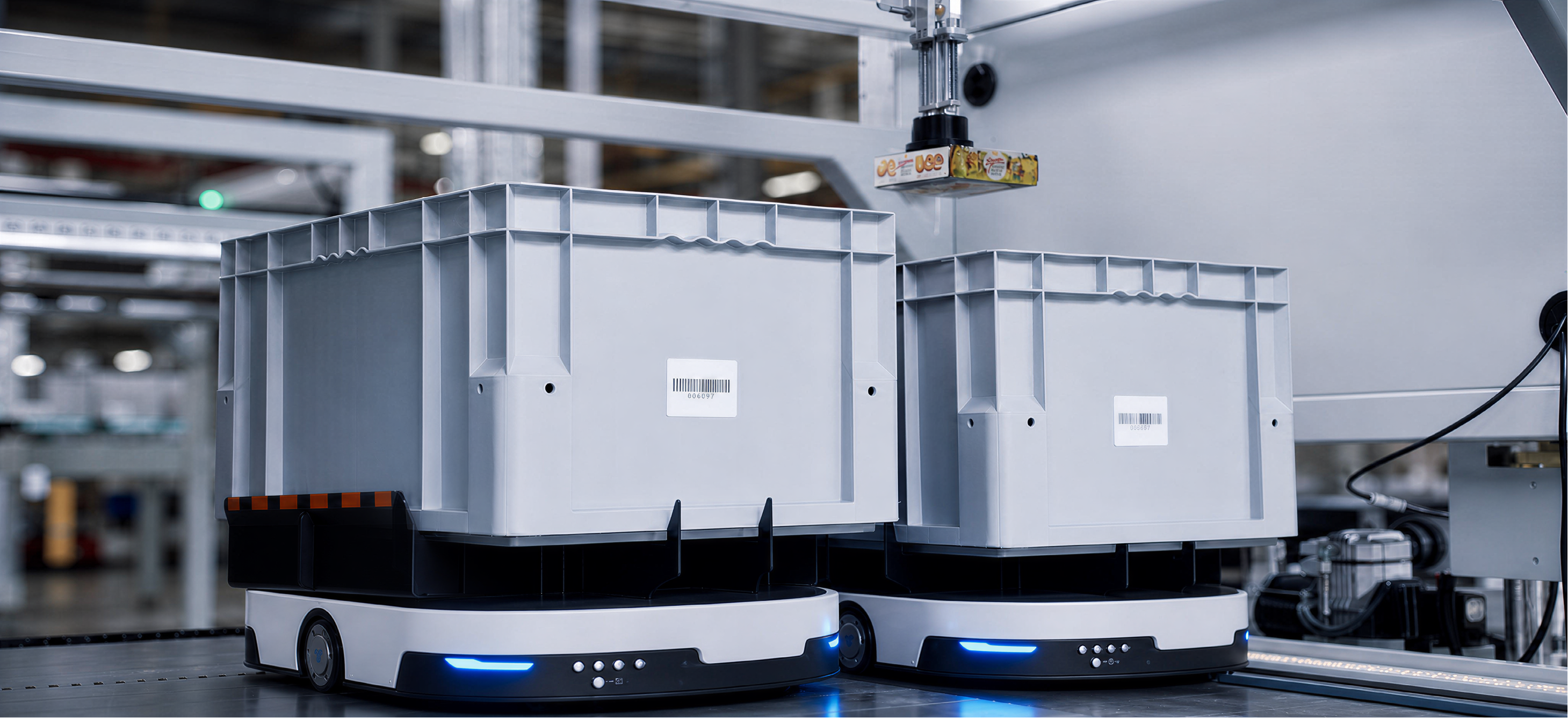 Two bin-carrying AMRs moving bins in a warehouse